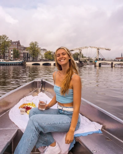 Magere Brug by boat in Amsterdam, the Netherlands