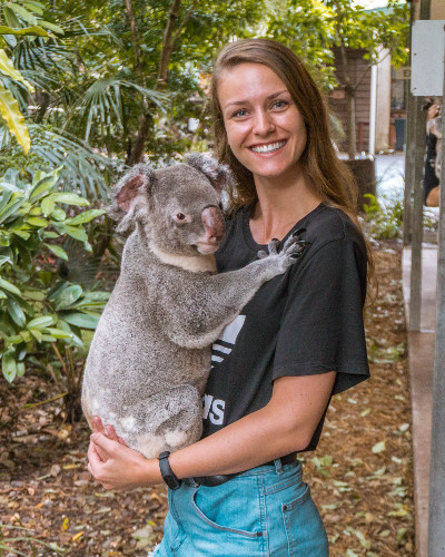 Holding a koala at the Lone Pine Koala Sanctuary in Brisbane, Australia
