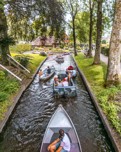 Busy canal in Giethoorn, the Netherlands
